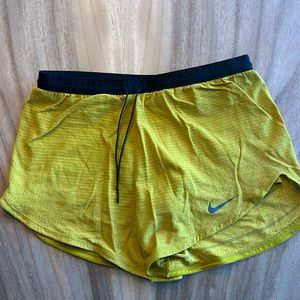 Mustard yellow Nike Running shorts
